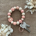 Porte-clés perles en silicone rose & beige – Fleur décorative et mousqueton doré Ma boutique