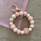 Porte-clés perles en silicone rose & beige – Fleur décorative et mousqueton doré Ma boutique