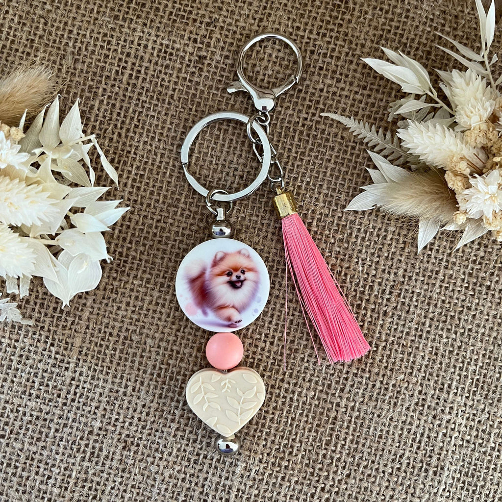 Bijou de sac chien Pomeranian avec pompon rose  pour sac à main Lanyard & Co
