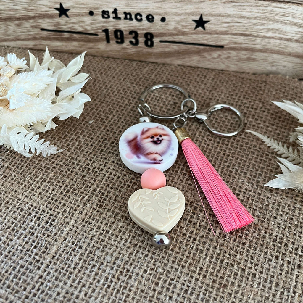 Bijou de sac chien Pomeranian avec pompon rose  pour sac à main Lanyard & Co