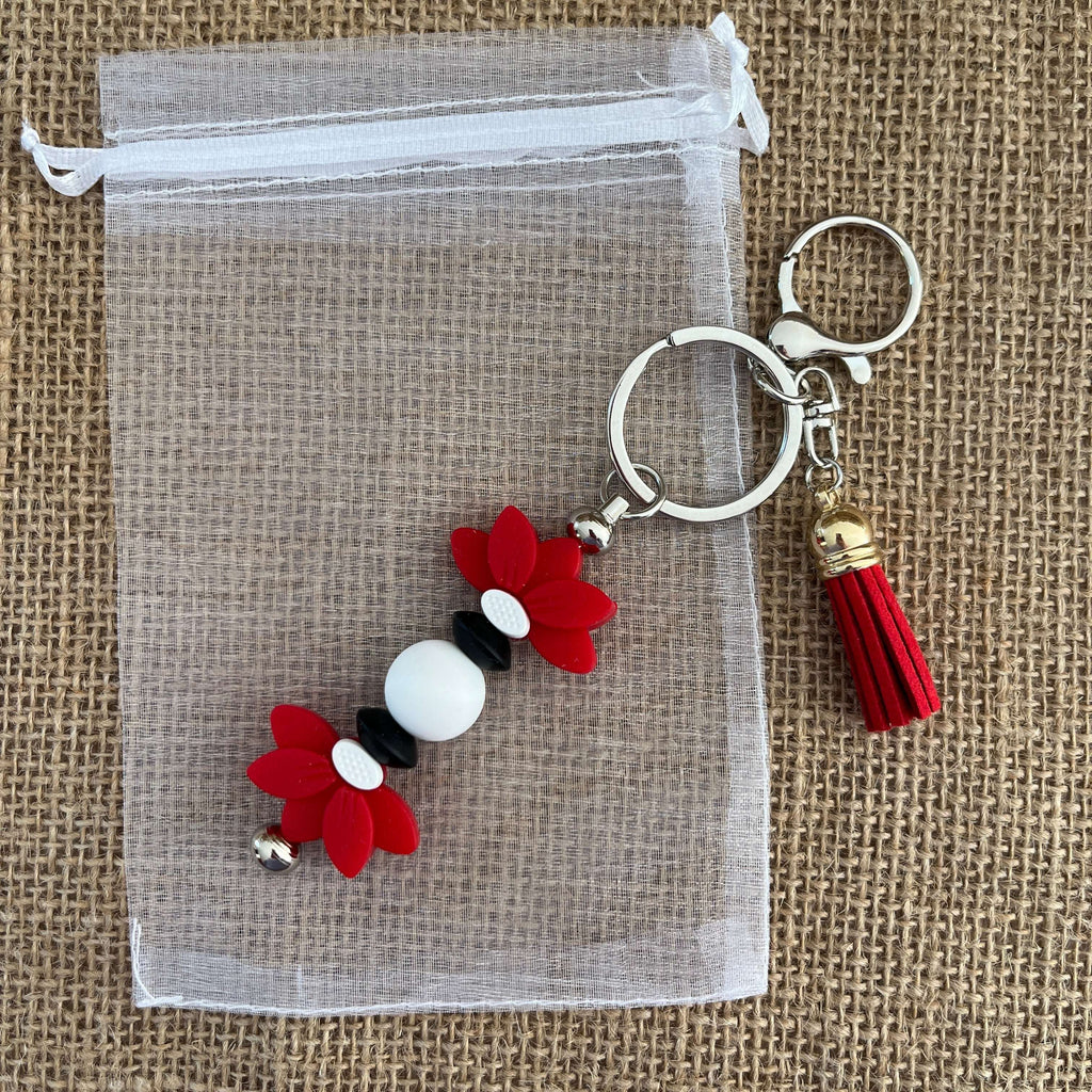 Bijou de sac fleur lotus rouge – Accessoire sac élégant et idée cadeau femme Lanyard & Co