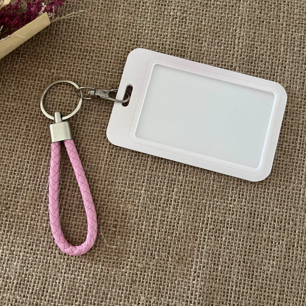 porte clef cordon tressé rose et mousqueton gris