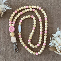 tour de cou marguerite rose creme infirmiere