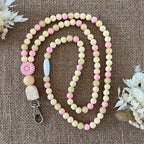 tour de cou marguerite rose creme infirmiere