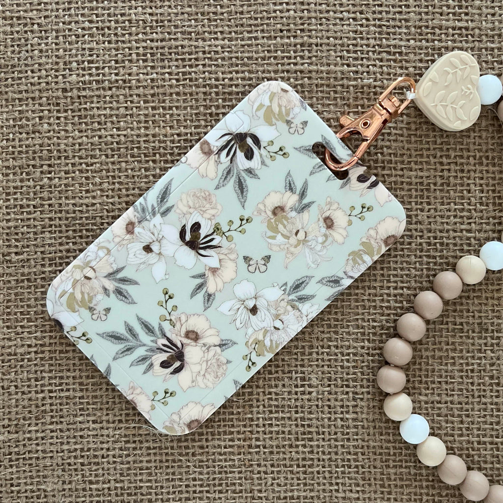 porte badge fleurs beige badge rigide élégant