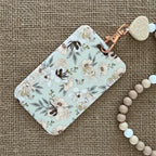 porte badge fleurs beige badge rigide élégant