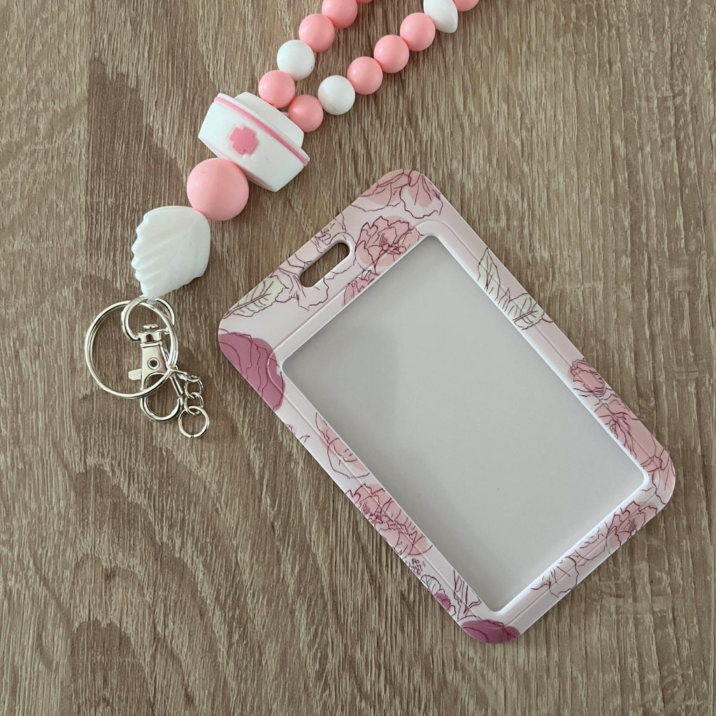 porte carte fleurs rose bus badge rigide 