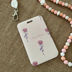 porte carte rigide coulissant, rose avec des dessins de roses seules