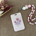 porte carte rigide coulissant, couleur rose clair avec 3 belles roses 