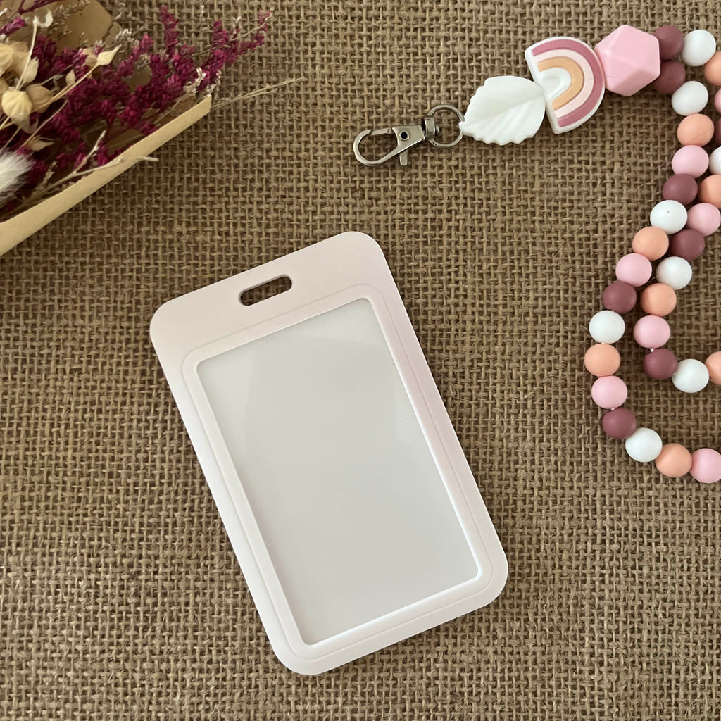 porte carte rigide coulissant, couleur rose clair avec 3 belles roses 